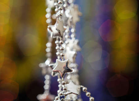 Christmas decoration against lights blurred backgroundの写真素材