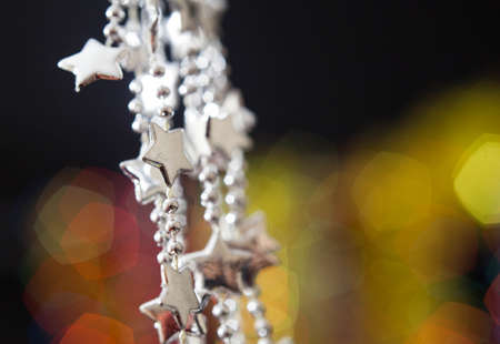 Christmas decoration against lights blurred backgroundの写真素材