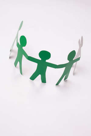 Paper team on the white background.の写真素材