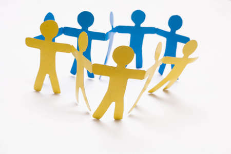 Paper team on the white background.
