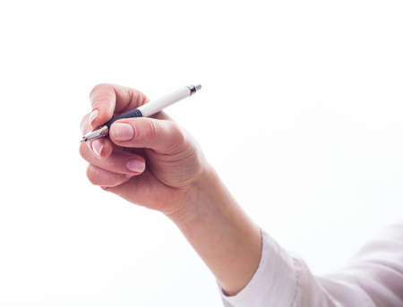 Isolated female hand is ready for writing.の写真素材