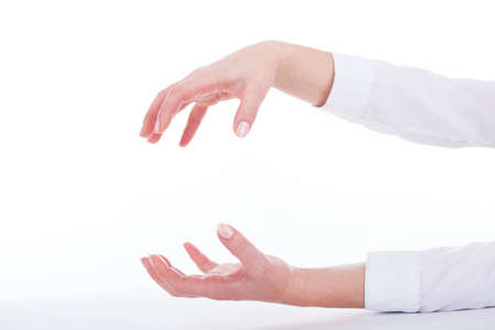 Isolated female hands in grasping gesture.の写真素材