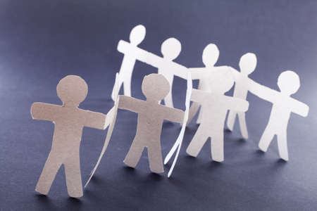 Partnership of paper team linked together.