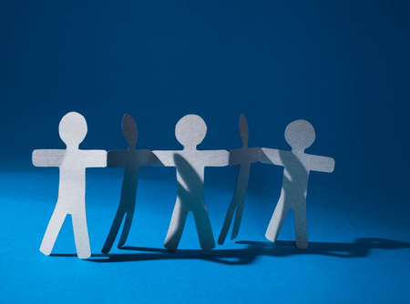 Partnership of paper team linked together.の写真素材