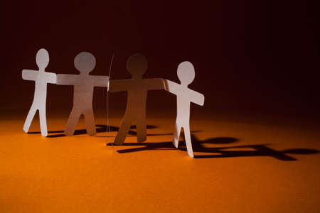 Partnership of paper team linked together.