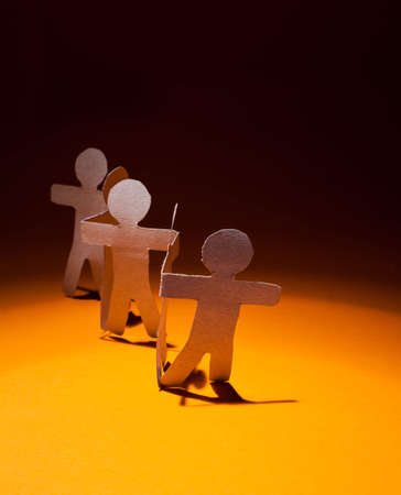 Partnership of paper team linked together.