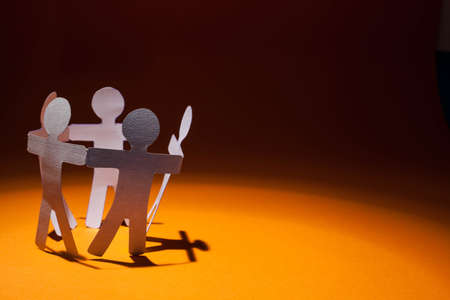 Partnership of paper team linked together.