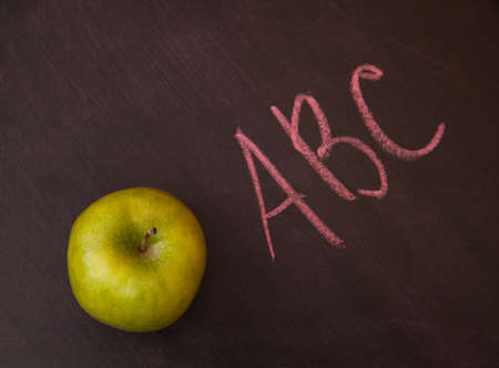 Classroom chalkboard with apples.の写真素材