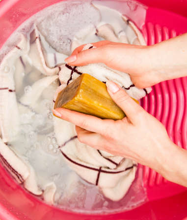 Hand delicate washing of clothes.の写真素材
