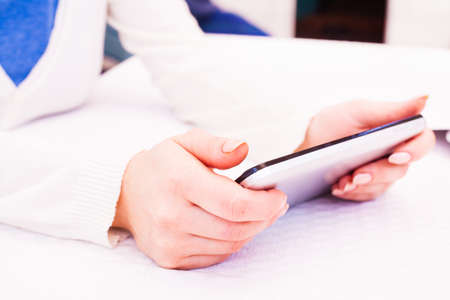 Businessman working on tablet computer - producing charts and reports