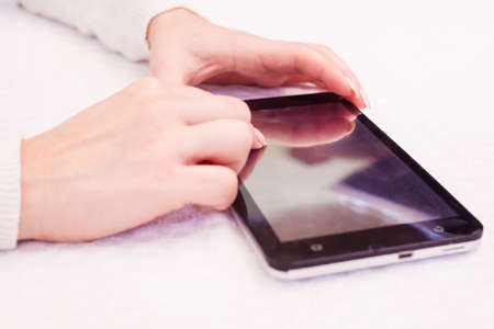 Businessman working on tablet computer - producing charts and reportsの写真素材