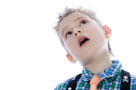 Young attractive man face looking up on the whiteの写真素材