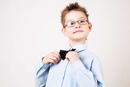 Photo of adorable young happy boy looking at camera.