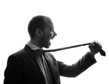 Caucasian businessman silhouette on the white backgroundの写真素材