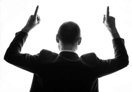 Caucasian businessman silhouette on the white backgroundの写真素材