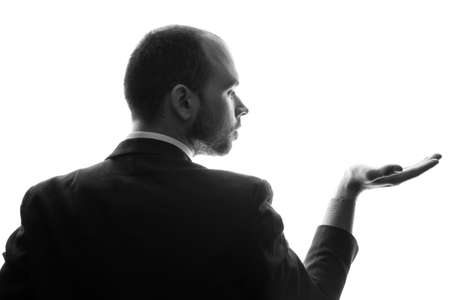 Caucasian businessman silhouette on the white background