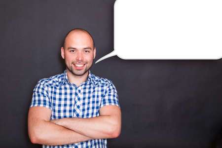portrait of  young man with  empty speech bubble の写真素材