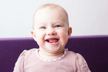 Smiling baby girlの写真素材
