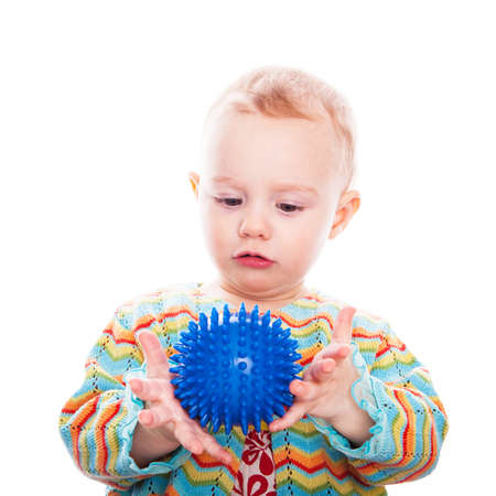 Cute baby play with ballの写真素材