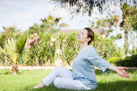 Yoga in the park.の写真素材