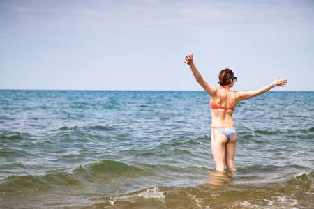 Happy woman and seaの写真素材