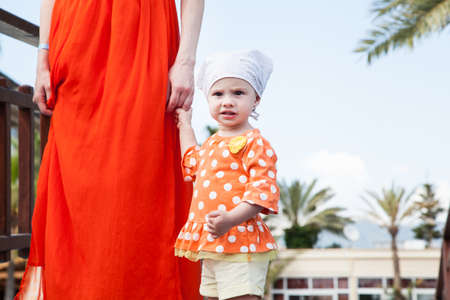 Baby holding mothers handの写真素材