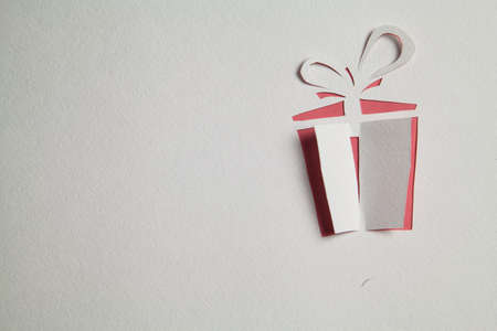 Origami gift box cut out from paper