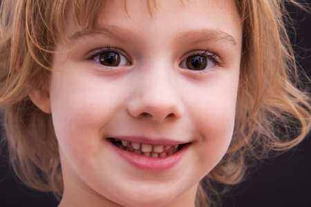 Portrait of a beautiful little girlの写真素材