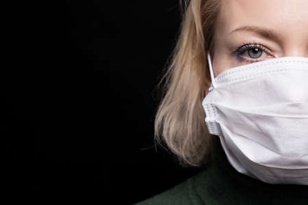 Stop coronavirus infection. The girl in the mask.の写真素材