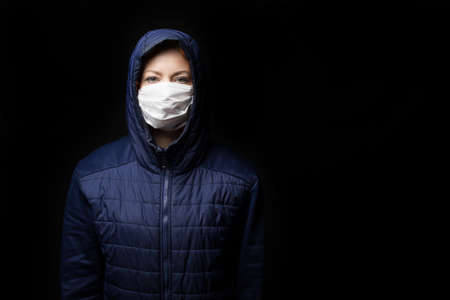 Stop coronavirus infection. The girl in the mask.