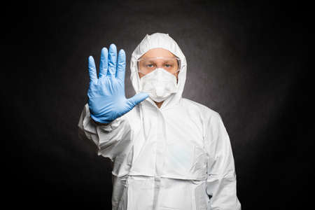 Safety virus infection concept. Man in protective suitの写真素材