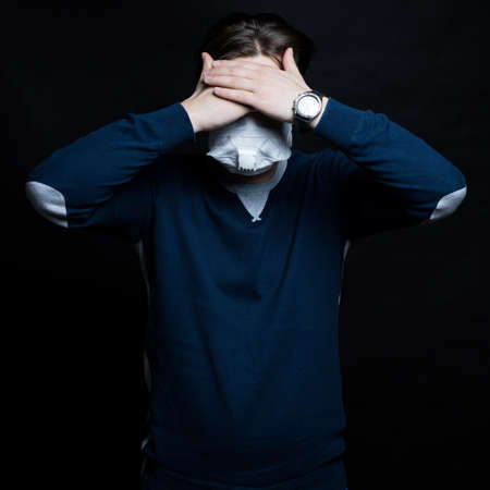 Stop coronavirus infection. The man in the mask.の写真素材