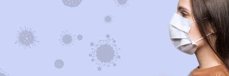 Stop coronavirus infection. The girl in the mask.の写真素材