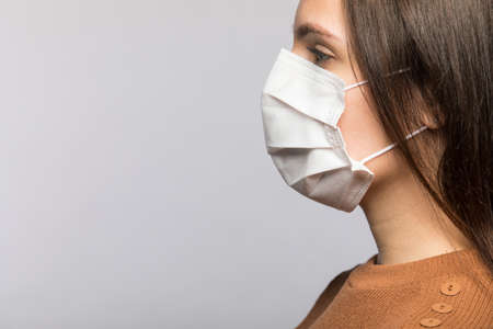 Stop coronavirus infection. The girl in the mask.の写真素材