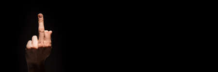 hand in fuck against the black background