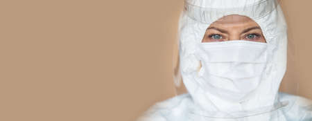 Female doctor wearing hygienic face surgical medical mask.