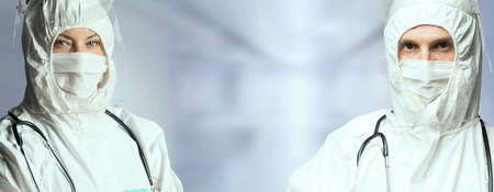 Doctors wearing hygienic face surgical medical mask.の写真素材
