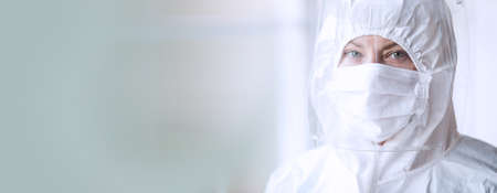 Female doctor wearing hygienic face surgical medical mask.