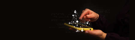 Two hands holding mobile with black background