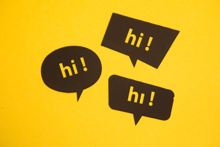 Hello speech bubble on the yellow background.の写真素材