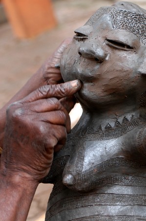   African artists working in clay                              の写真素材