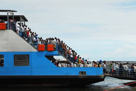 Dar es Salaam, Tanzania in February .2010: passengers in the ferry that leaves from the capital Dar Es Salaam to Bagamoyo.のeditorial素材