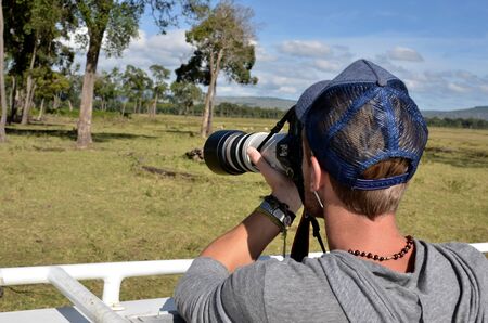  photographer in the African savannah  の写真素材