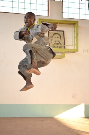 Malindi ,Kenya-October 20, 2011:An African trains him in a gym of the Vo Vietnam.This gym has been created by a teacher of the Italian Franco Oriot. The annual recording is of 3 shillings one monthのeditorial素材