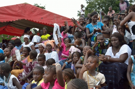 Kartiak, Senegal- September 27,2012: spectators that assists the traditional struggle of Senegal, this sport is the most ancient competitive discipline in Senegal, this sport is the most beloved in Senegalのeditorial素材