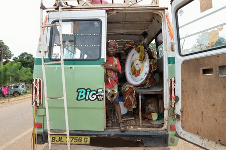 Kartiak,Senegal-September 18,2012 :An unidentified African child into a van to go to the ritual of Boukoutt of Initiation ceremony on September 18, 2012 in Kartiak, Senegal. The ceremony occurs every 30 years and celebrates boys becoming men.のeditorial素材