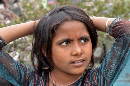 New Delhi,India-February 4, 2013:An unidentified child lives in the slums of New Delhi on February 4,2013 in New Delhi. のeditorial素材
