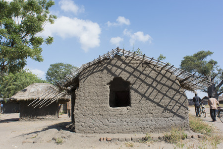 typical African house made of mud bricksの写真素材