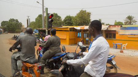 motorcyclists Ouagadougou the capital of Burkina Fasoの写真素材