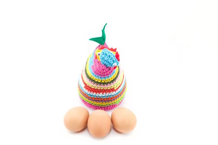Colorful knitting chicken with eggsの写真素材